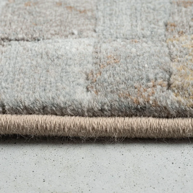 Tapis beige/gris cube