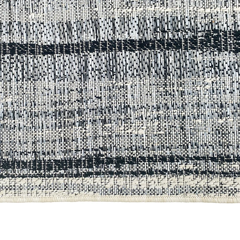 Tapis extérieur noir et blanc