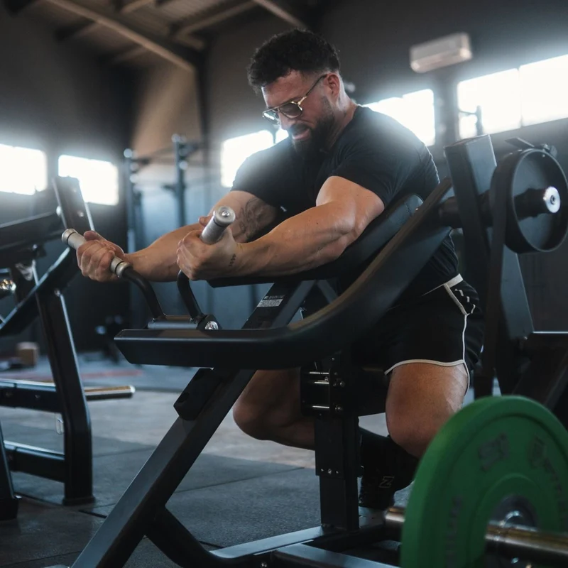 Biceps Curl avec Charge de Disques